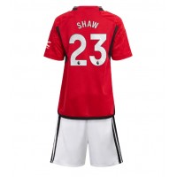 Koszulka piłkarska Manchester United Luke Shaw #23 Strój Domowy dla dzieci 2023-24 tanio Krótki Rękaw (+ Krótkie spodenki)